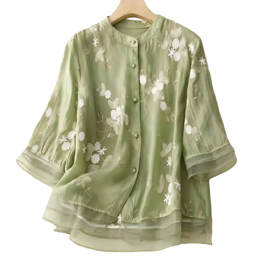 Chemisier pour femme avec patte de boutonnage, encolure arrondie et structure florale