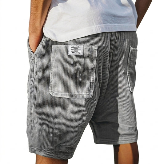 Hommes Shorts à texture de lignes verticales en relief avec poches arrière et étiquette Gris