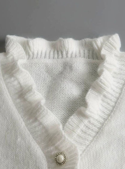 Pull en maille pour femme avec col en V à volants et détails boutonnés 4