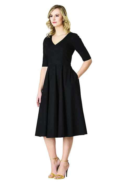 Robe midi pour femme avec encolure en V et jupe plissée