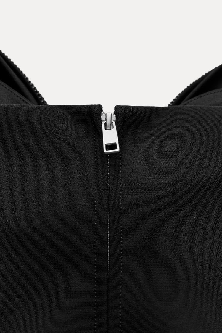 Haut pour femme avec nœud frontal et fini scintillant | imported-image-4
