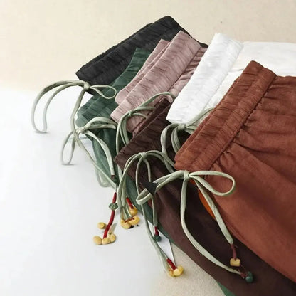 Pantalon femme taille haute avec jambes droites, cordon de serrage et poches latérales-Pants Female-Gigié