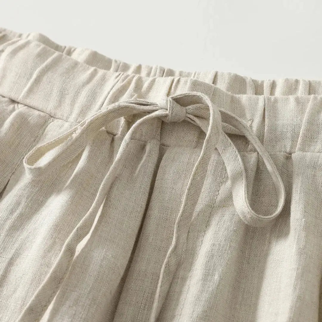 Pantalon femme taille haute avec jambes larges, cordon de serrage et poches latérales-Pants Female-Gigié