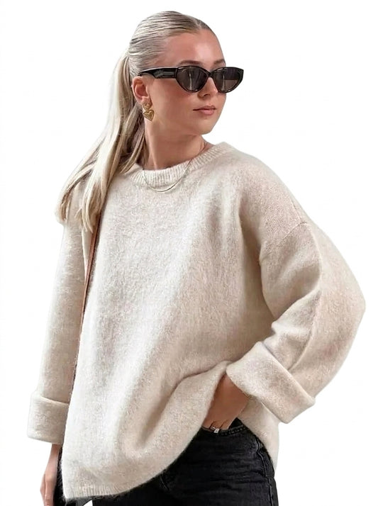 Pull en maille pour femme avec col rond et épaules tombantes 1