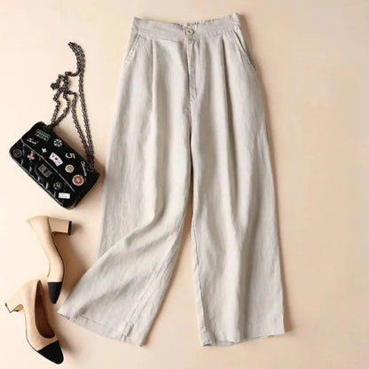 Pantalon femme taille haute avec jambes larges, plis frontaux et poches latérales