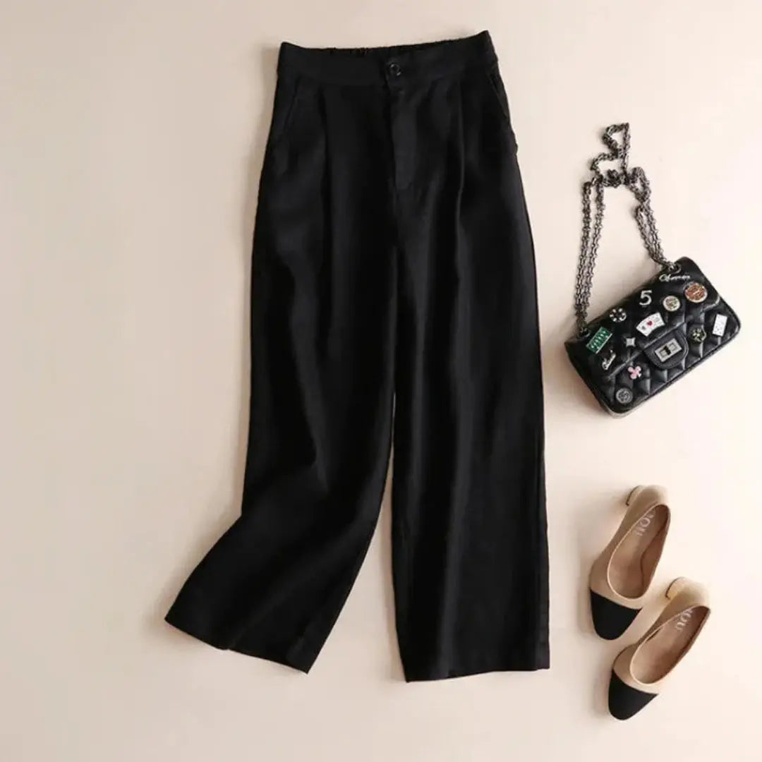 Pantalon femme taille haute avec jambes larges, plis frontaux et poches latérales