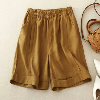 Short femme à taille élastique avec ourlet retroussé et poches latérales-Shorts for women-Gigié