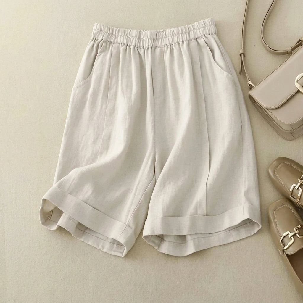 Short femme à taille élastique avec ourlet retroussé et poches latérales-Shorts for women-Gigié