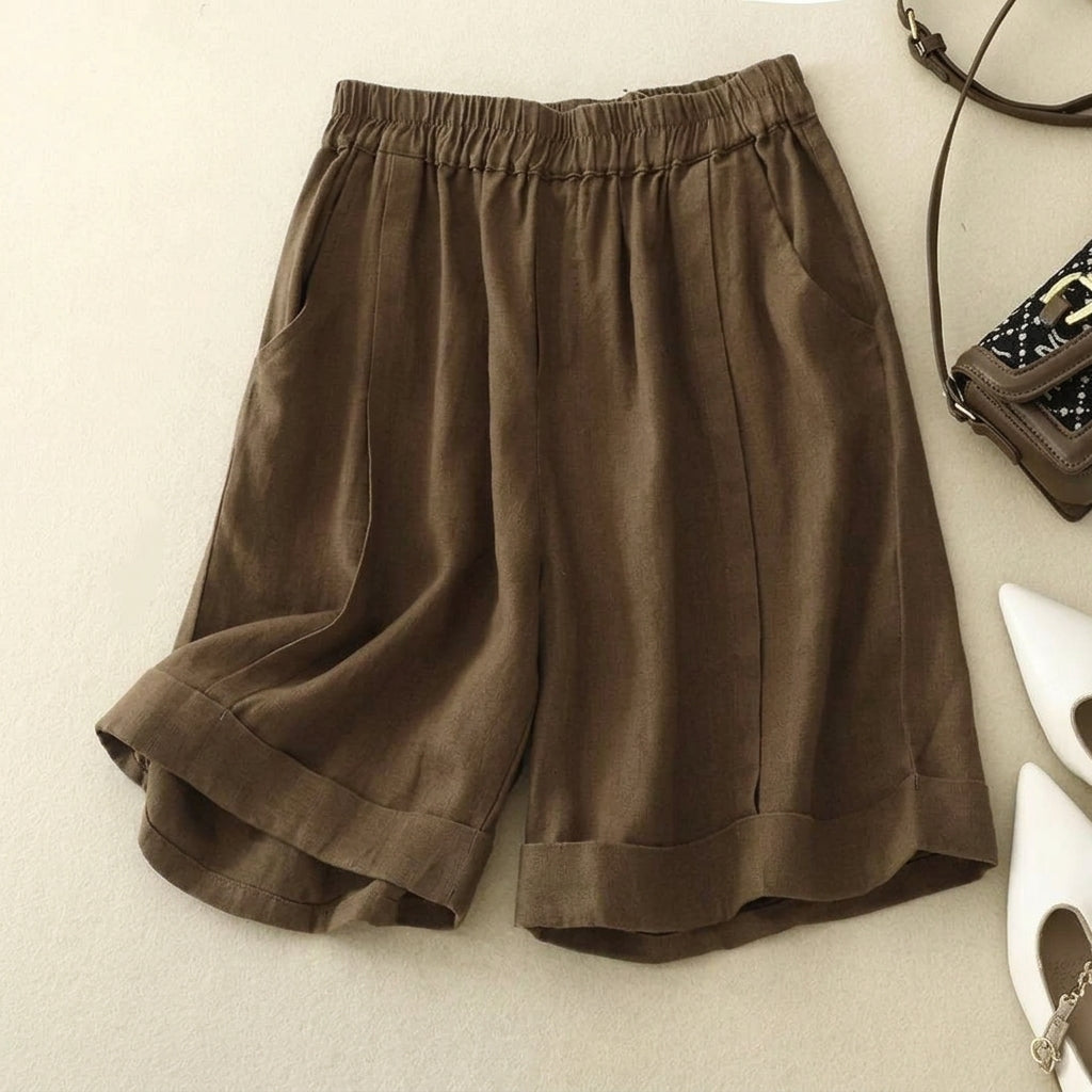 Short femme à taille élastique avec ourlet retroussé et poches latérales-Shorts for women-Gigié
