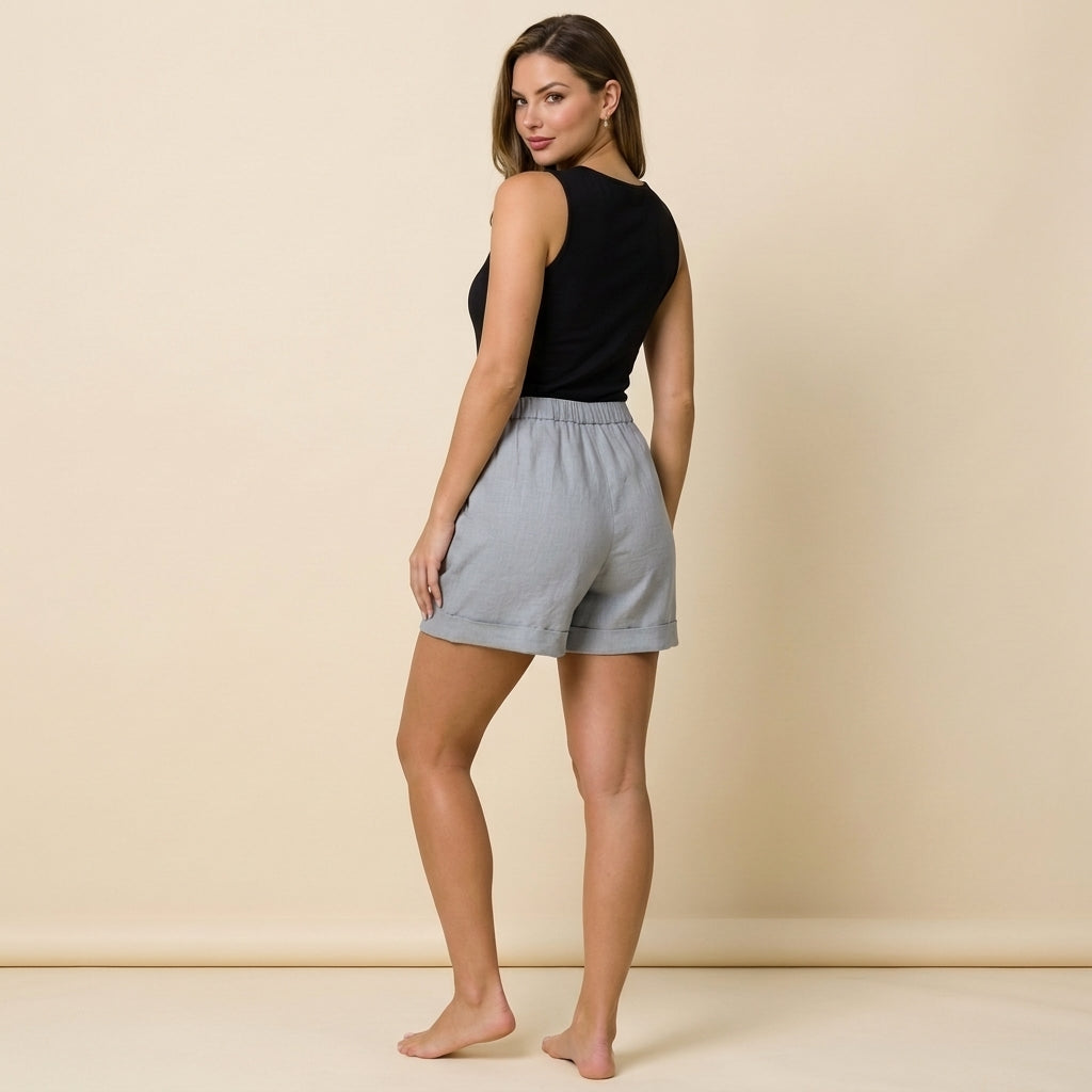 Short femme à taille élastique avec ourlet retroussé et poches latérales-Shorts for women-Gigié