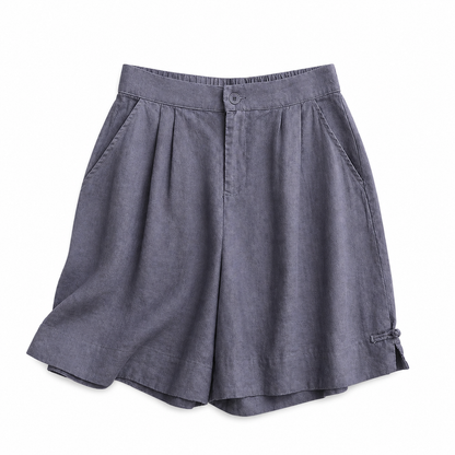 Short femme taille haute avec fermeture boutonnée, plis et poches latérales